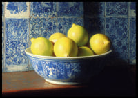 Colorful lemons in a classic bowl spread freshness.-6