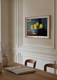 Colorful lemons in a classic bowl spread freshness.-8