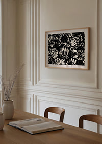 Black and white flowers create a dramatic pattern.-8