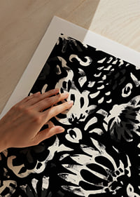 Black and white flowers create a dramatic pattern.-9