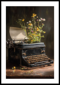 Une machine à écrire avec des fleurs crée un sentiment nostalgique.-0