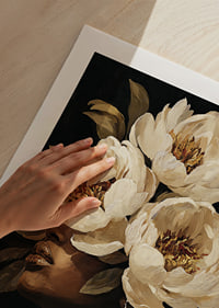 Blooming flowers surround a woman's face-9