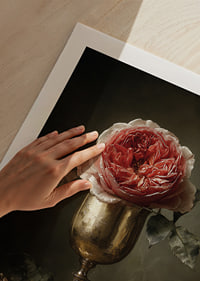 A rose in an antique goblet exudes timeless beauty.-9