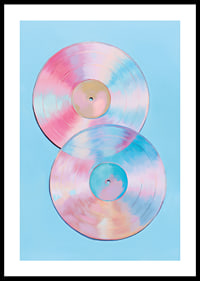 Two shimmering vinyl records in pastel tones against a blue background.-0