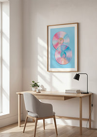 Two shimmering vinyl records in pastel tones against a blue background.-8