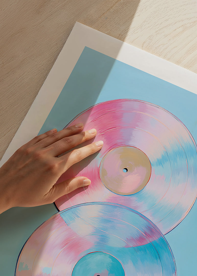 Two shimmering vinyl records in pastel tones against a blue background.-12