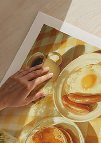 A sunny breakfast of pancakes and eggs in a warm atmosphere.-9