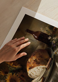 A still life of sunflowers and bread in natural light.-9