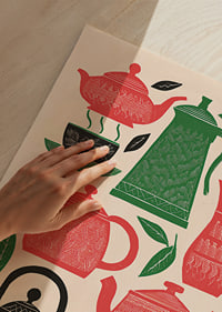 Colorful tea and coffee pots create charm and warmth.-3