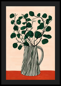 Ett elegant grönt bladverk i en randig kanna-4