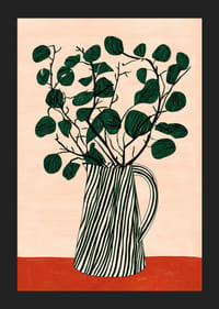 Ett elegant grönt bladverk i en randig kanna-5