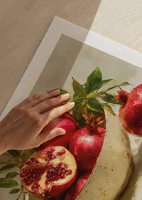 Vibrant poster with pomegranates in a bowl, full of color and life-9