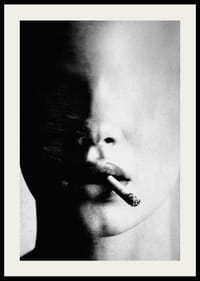 A mysterious face partially hidden in the shadows with a cigarette-2