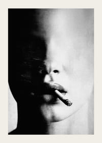 A mysterious face partially hidden in the shadows with a cigarette-3