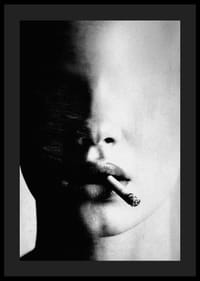 A mysterious face partially hidden in the shadows with a cigarette-4