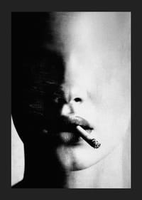 A mysterious face partially hidden in the shadows with a cigarette-5