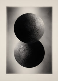 Two intertwined spheres in elegant contrast-1