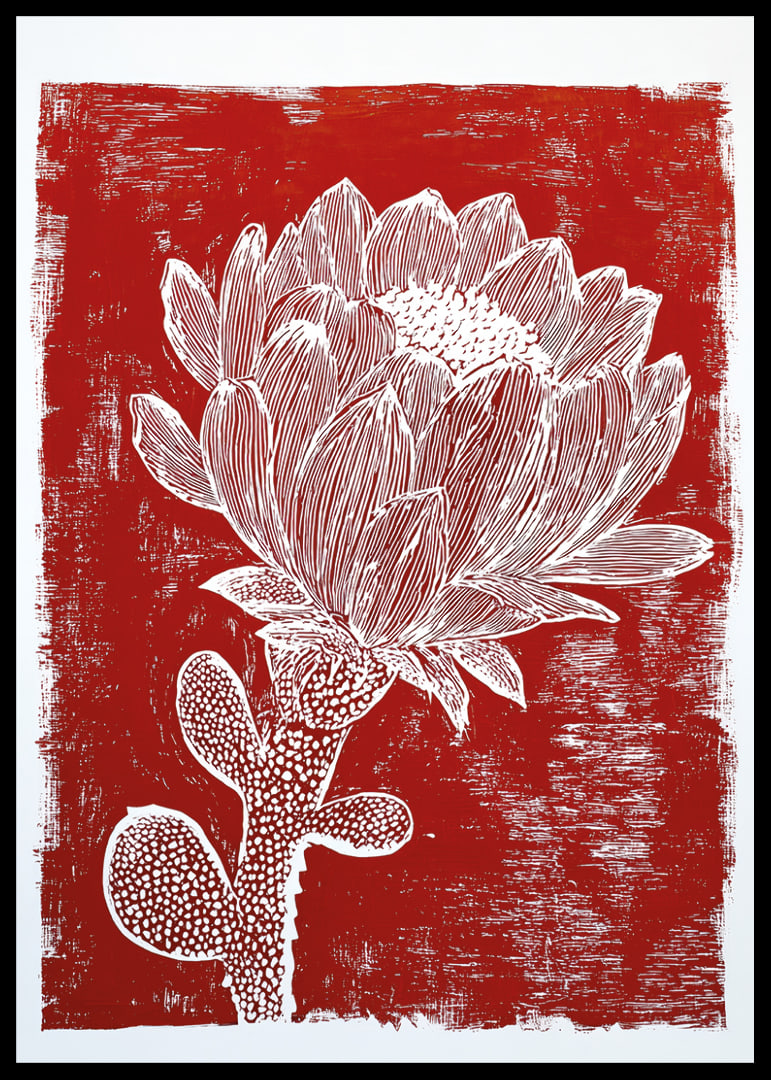 Une fleur blanche sur fond rouge crée un effet saisissant.-12