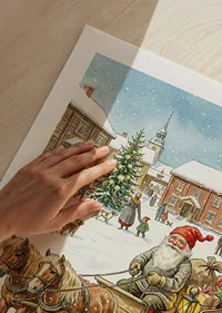 Tomten kommer med klappar i en snötäckt by-9