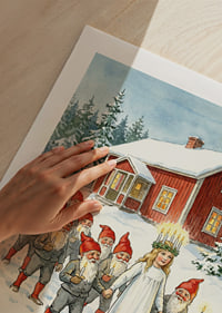 A procession of lights of Santa Claus and Lucia in the snowy landscape-9