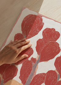 Vibrant tulips in red tones create a dreamlike atmosphere.-3