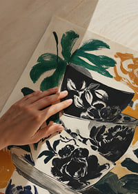 Colorful teacups with floral motifs for a vibrant atmosphere.-3