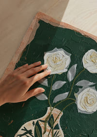 Timeless roses shine against a deep green background.-3