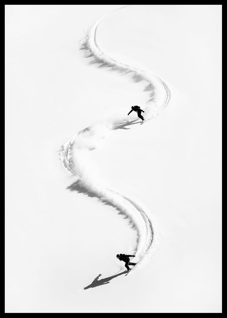 Two skiers meander through the white landscape of snow.-12