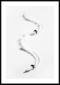Two skiers meander through the white landscape of snow.-0