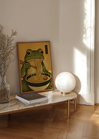 A frog enjoys noodles in a warm, inviting meal.-8