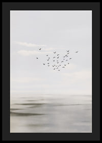 Birds soar in a soft sky over a calm sea.-4