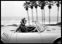 Classic car ride in a Porsche 550 Spyder along the coast gives a sense of freedom and style.-6