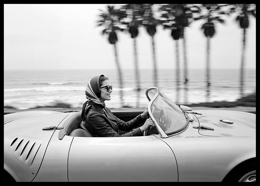 Classic car ride in a Porsche 550 Spyder along the coast gives a sense of freedom and style.-12