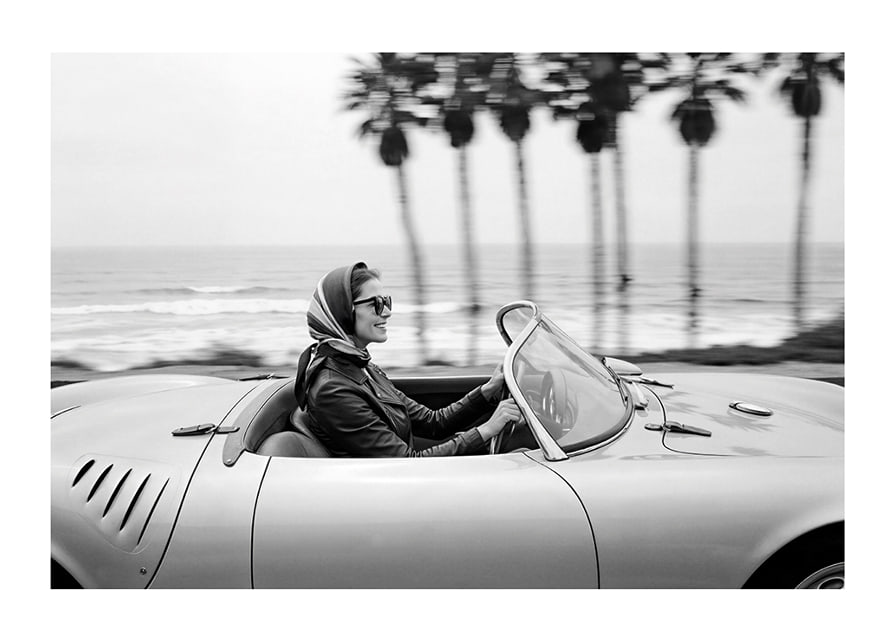 Classic car ride in a Porsche 550 Spyder along the coast gives a sense of freedom and style.-12