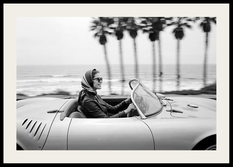 Classic car ride in a Porsche 550 Spyder along the coast gives a sense of freedom and style.-12