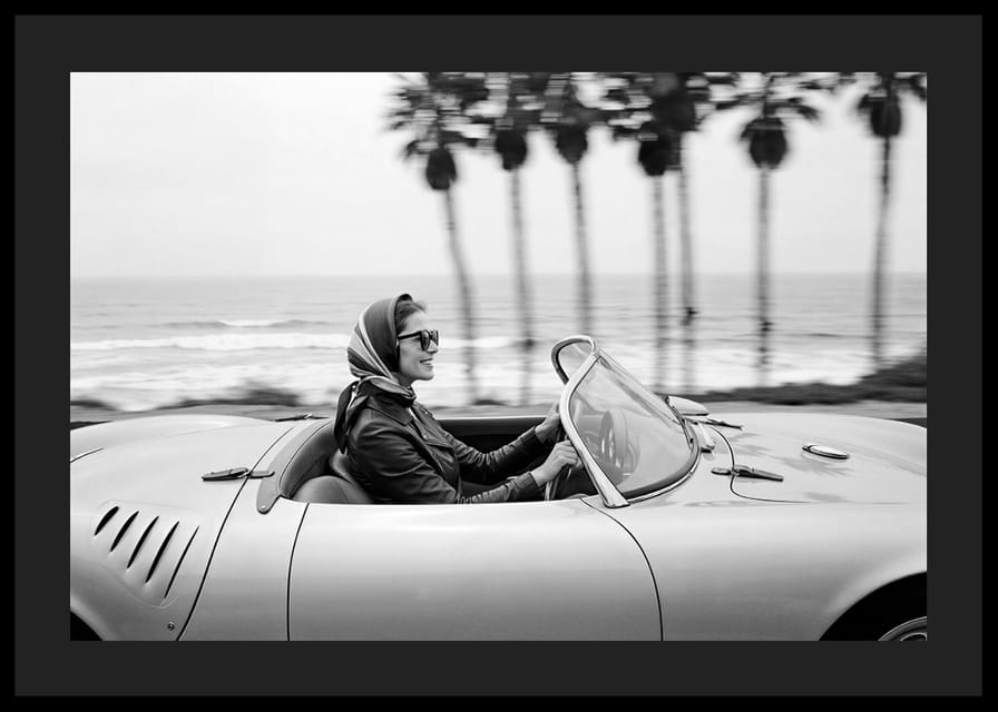 Classic car ride in a Porsche 550 Spyder along the coast gives a sense of freedom and style.-12