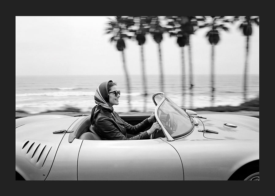 Classic car ride in a Porsche 550 Spyder along the coast gives a sense of freedom and style.-12