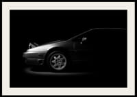 A Lotus Esprit shrouded in shadows exudes dramatic elegance.-4