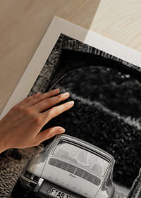 A classic Porsche 911 in a rainy landscape gives a nostalgic feeling.-5