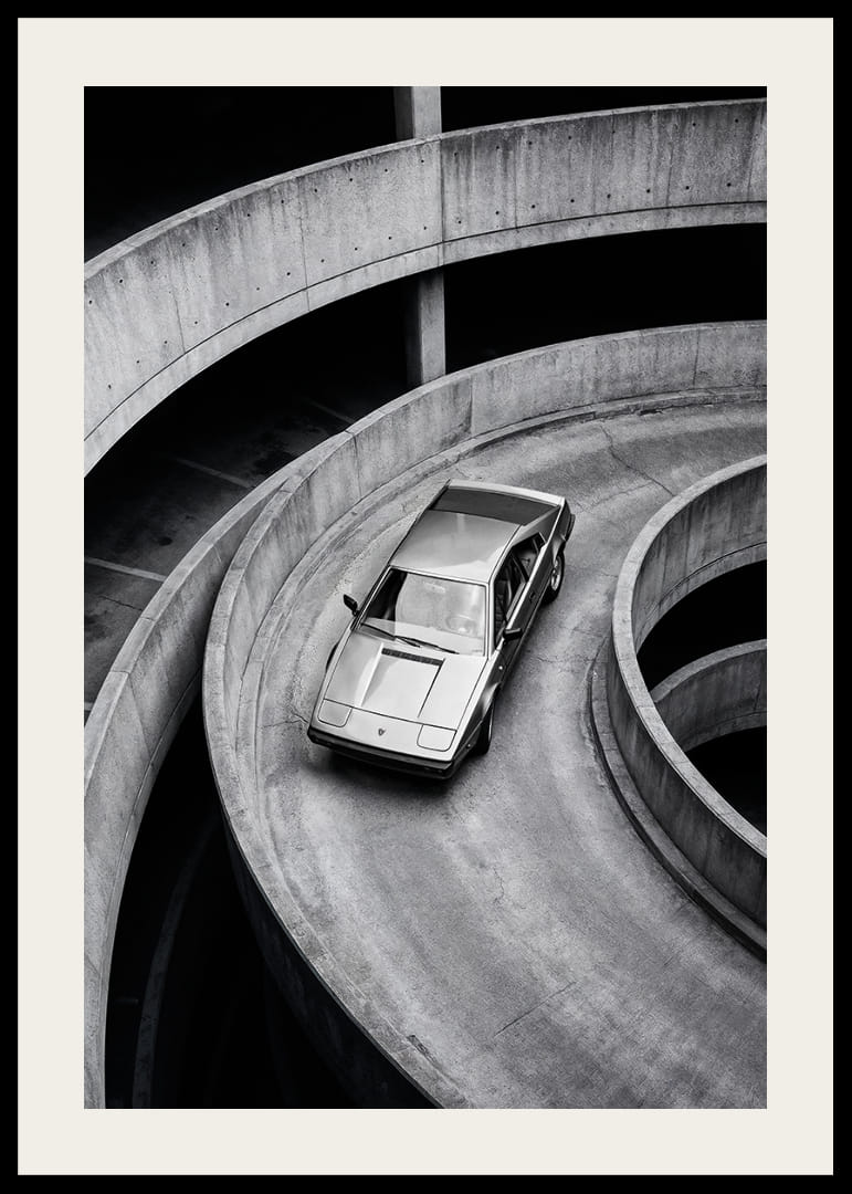 A Lamborghini Jalpa car sweeps through a spiraling concrete road in elegant style.-12