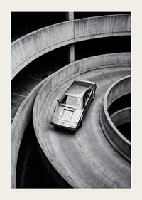 A Lamborghini Jalpa car sweeps through a spiraling concrete road in elegant style.-3