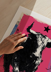 The bull rushes forward across a vibrant pink background.-9