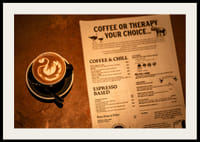A hot cup of coffee alongside an engaging menu selection.-4