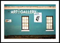 A vibrant turquoise facade attracts visitors to the world of creativity.-2