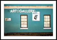 A vibrant turquoise facade attracts visitors to the world of creativity.-2