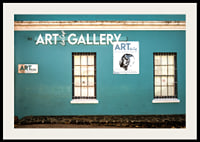 A vibrant turquoise facade attracts visitors to the world of creativity.-4