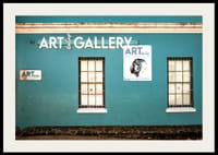 A vibrant turquoise facade attracts visitors to the world of creativity.-4