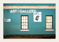 A vibrant turquoise facade attracts visitors to the world of creativity.-5