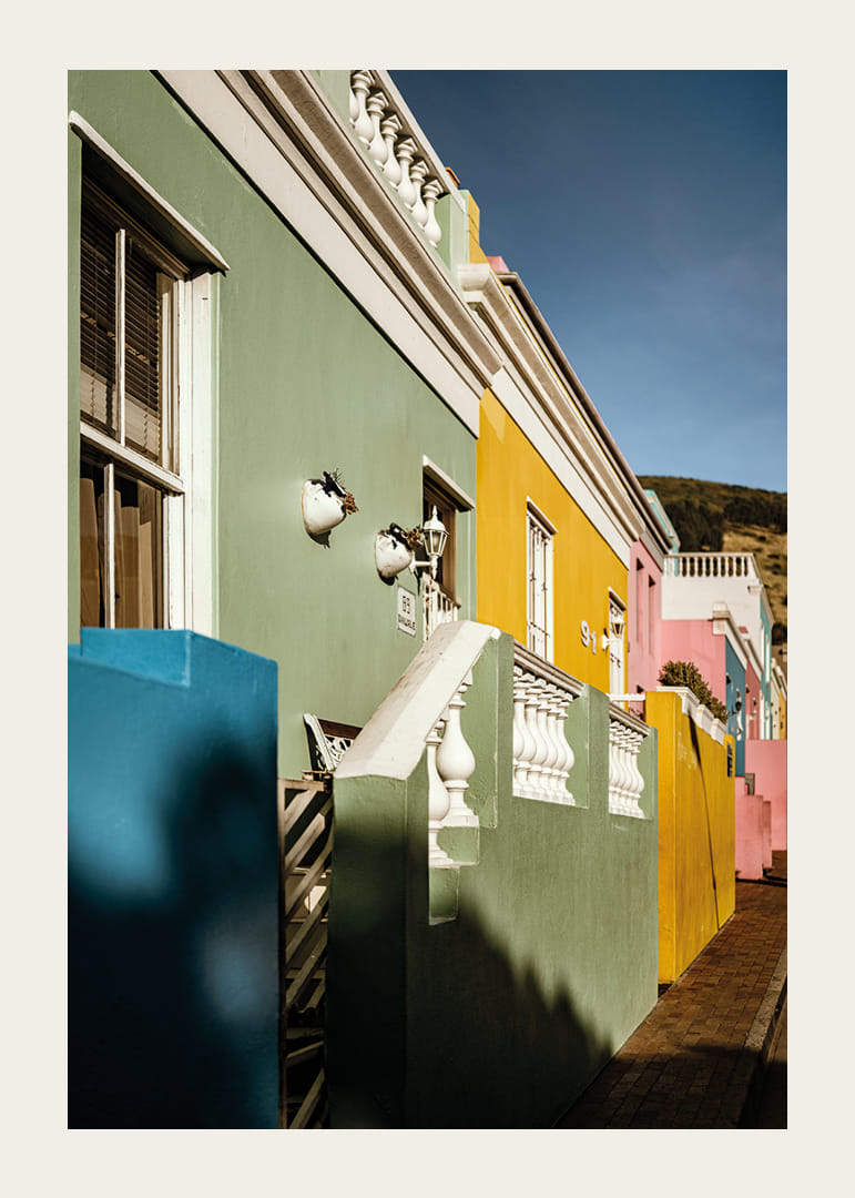 Colorful houses light up the street with life and energy.-12