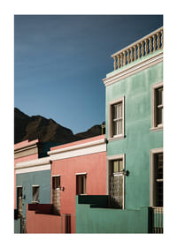 Colorful houses in sharp contrast to the silhouette of the mountains.-3